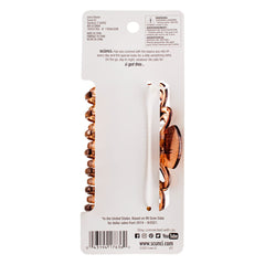 Scunci No Slip Crown Clip retient tout volume pour une coiffure durable.