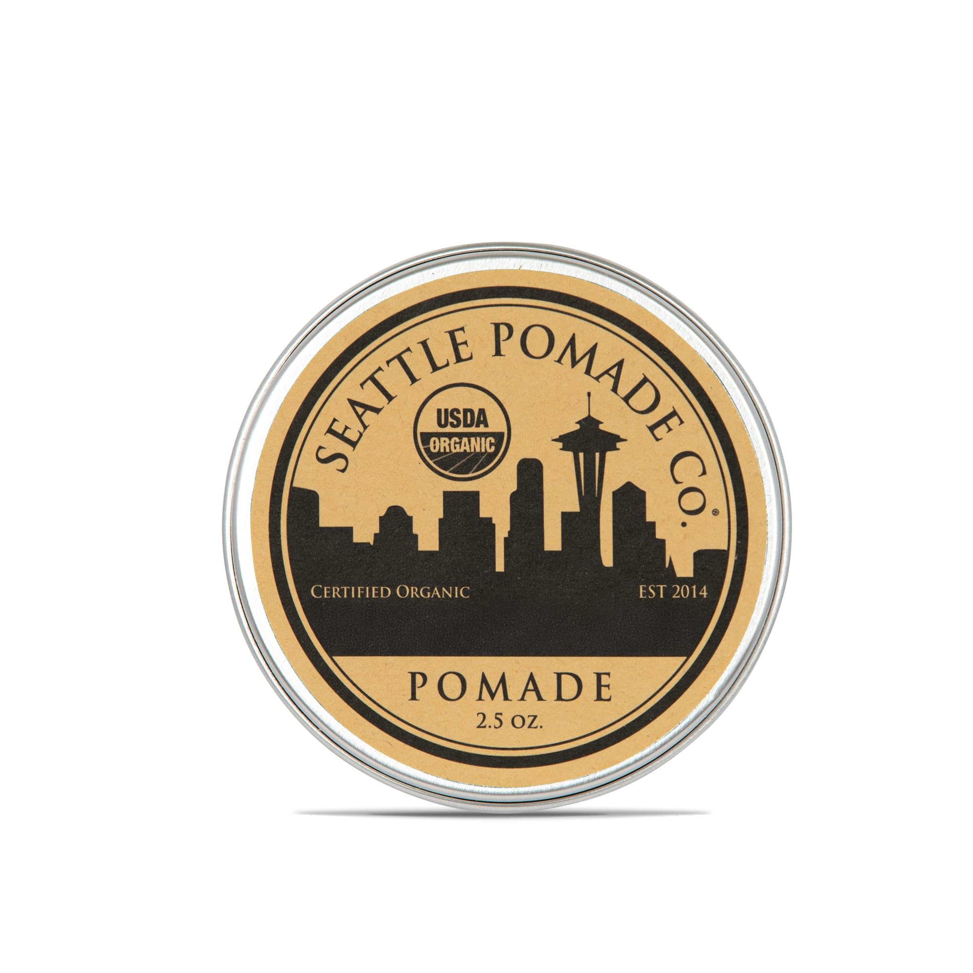 Seattle Pomade Co. pomade bio en pot révélant la cire d'abeille naturelle.
