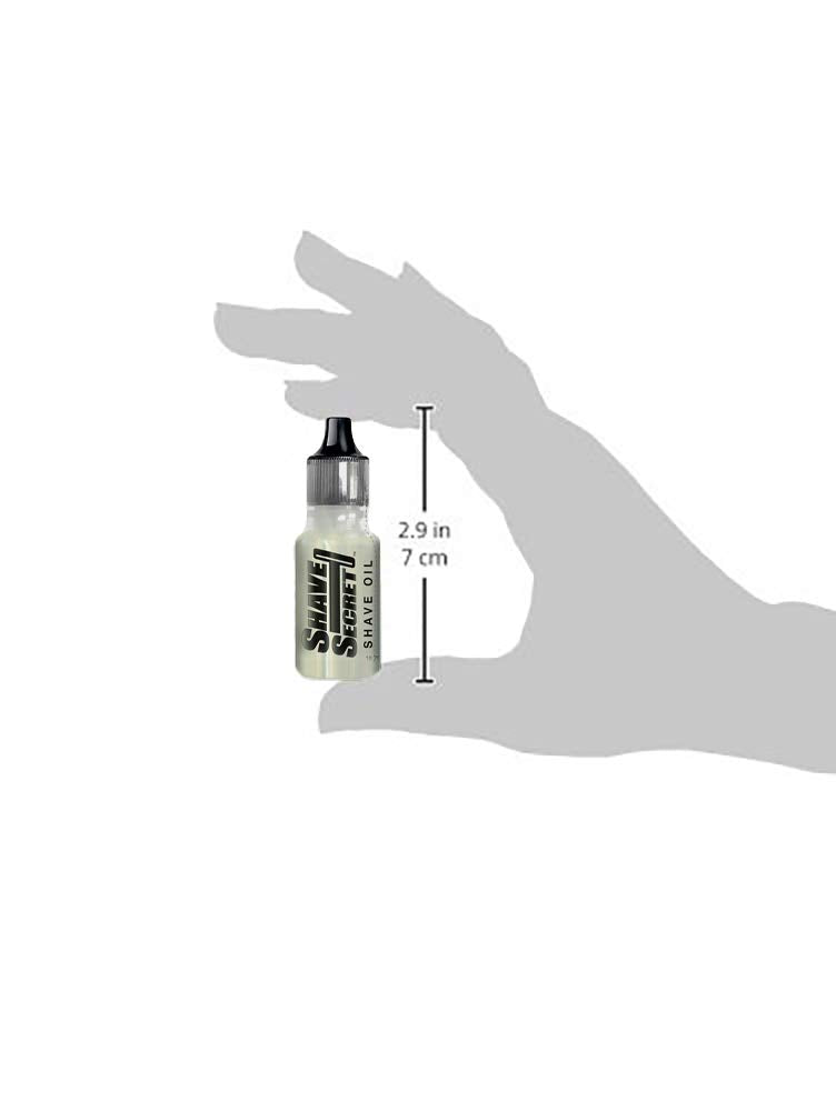 Gouttes d'huile Shave Secret en application, réduction potentielle des irritations durant le rasage