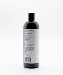 Shea Radiance body wash being poured to create luxurious foaming lather.
