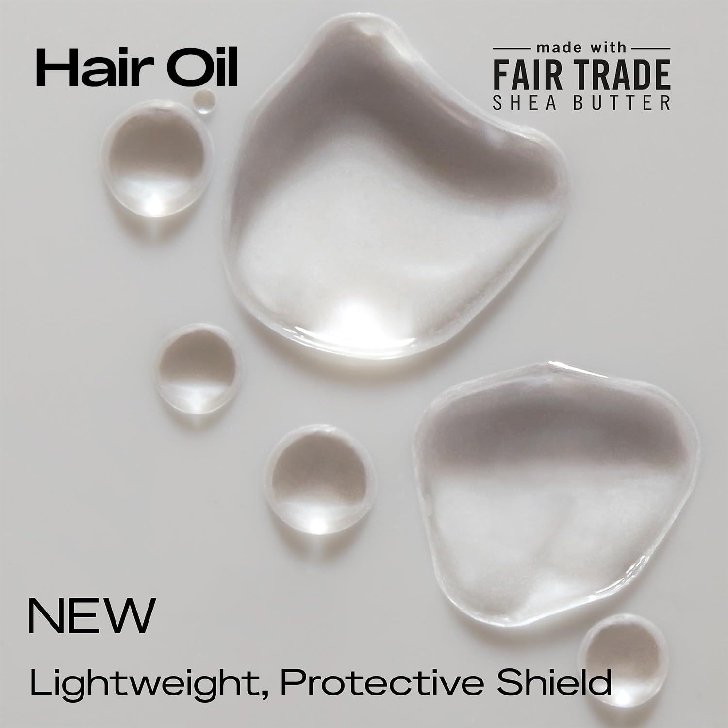 Cheveux bouclés hydratés et brillants grâce à SheaMoisture.