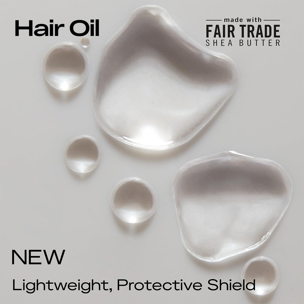 Cheveux bouclés hydratés et brillants grâce à SheaMoisture.