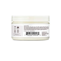Huile de coco SheaMoisture, application-cheveux, démêle et nourrit les longueurs.