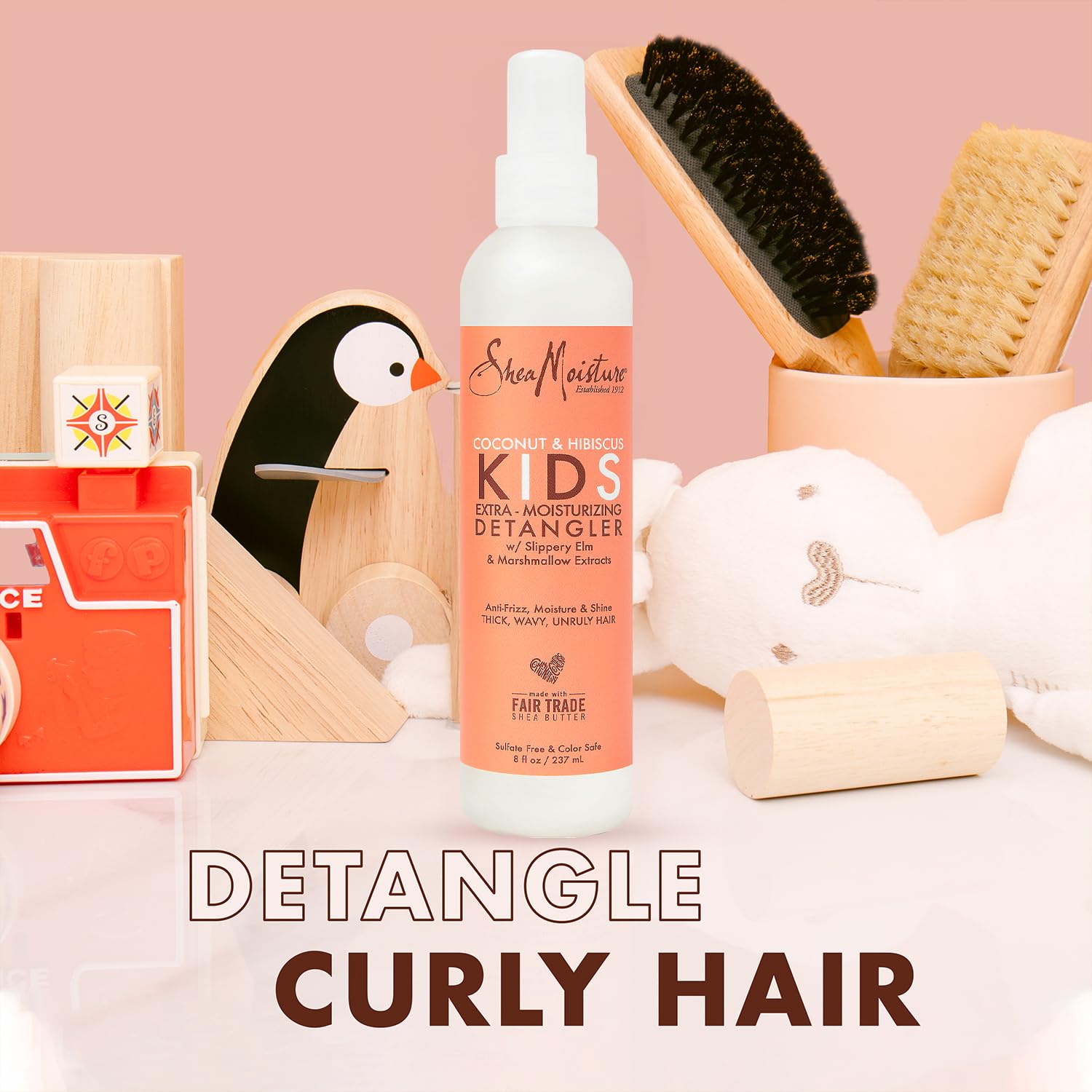Cheveux d'enfant avec brillance naturelle après les soins Mango.