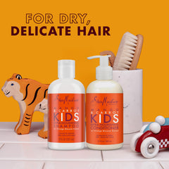 Démêlant spray SheaMoisture Kids coco hibiscus pour cheveux faciles à coiffer.