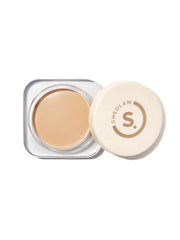 SHEGLAM Hydratante Creme Base Teint Shell — bouteille élégante, hydratation et haute couverture.