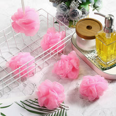 Shellwei éponge douche mini rose, exfoliation douce pour peau propre et fraîche.