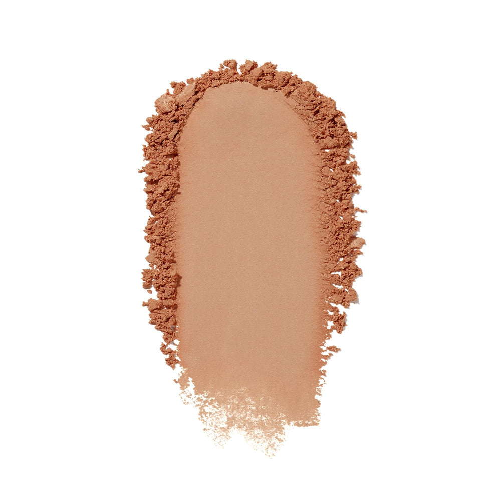 Texture poudre légère et fini naturel du fond teint Shiseido.