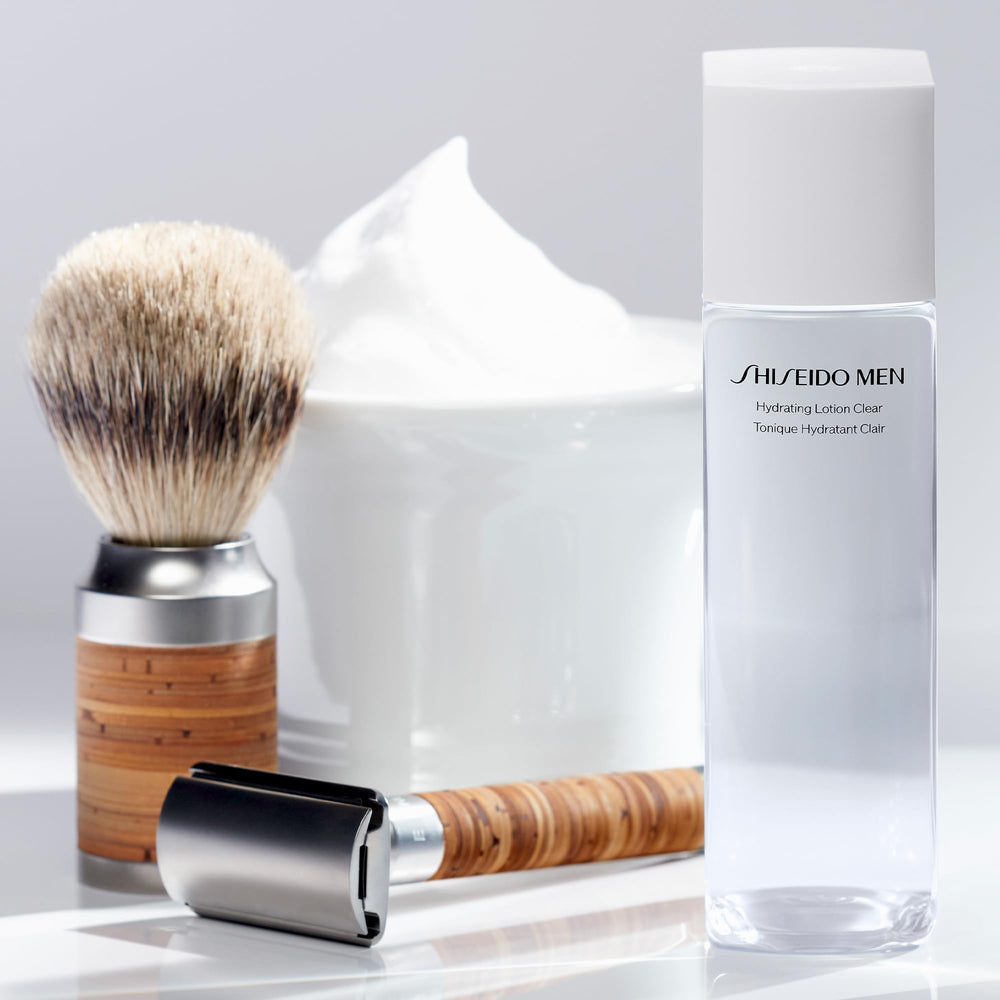 Infographie des ingrédients clés et bénéfices de la lotion Shiseido Men.