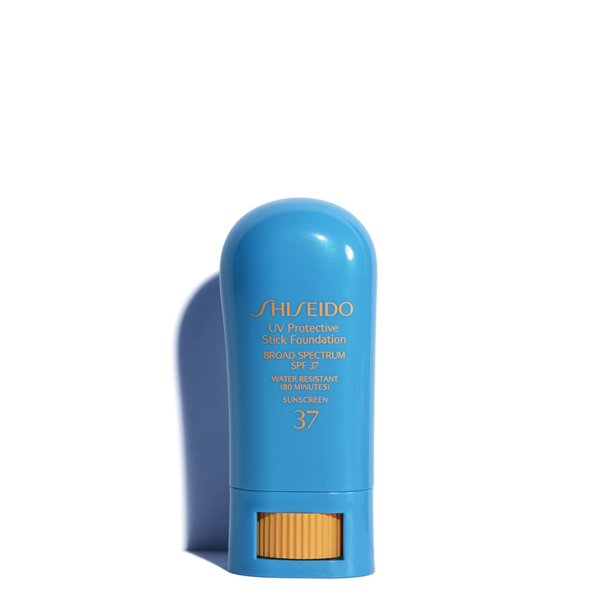 Fond de teint stick Shiseido UV SPF37 en teinte ivoire pâle pour une couvrance naturelle.