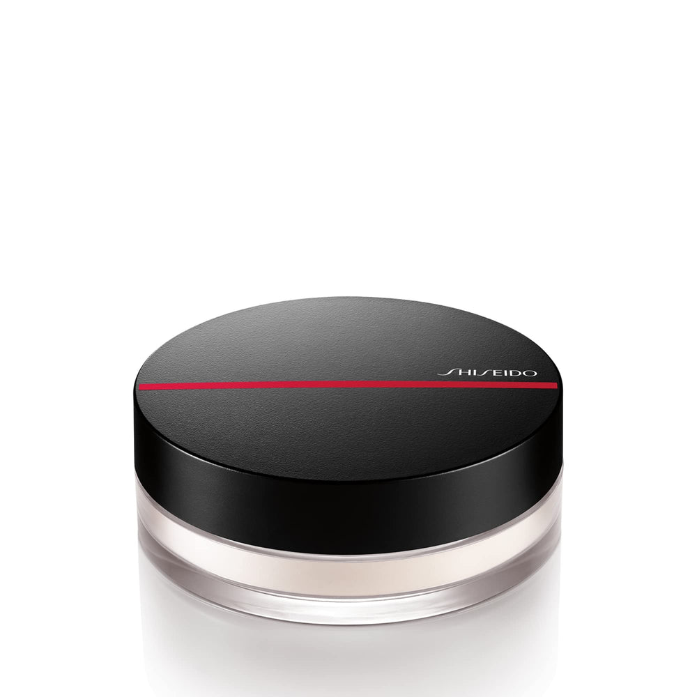 Shiseido Synchro Skin Invisible Silk Poudre Libre – Bouteille élégante, contrôle de brillance discret.