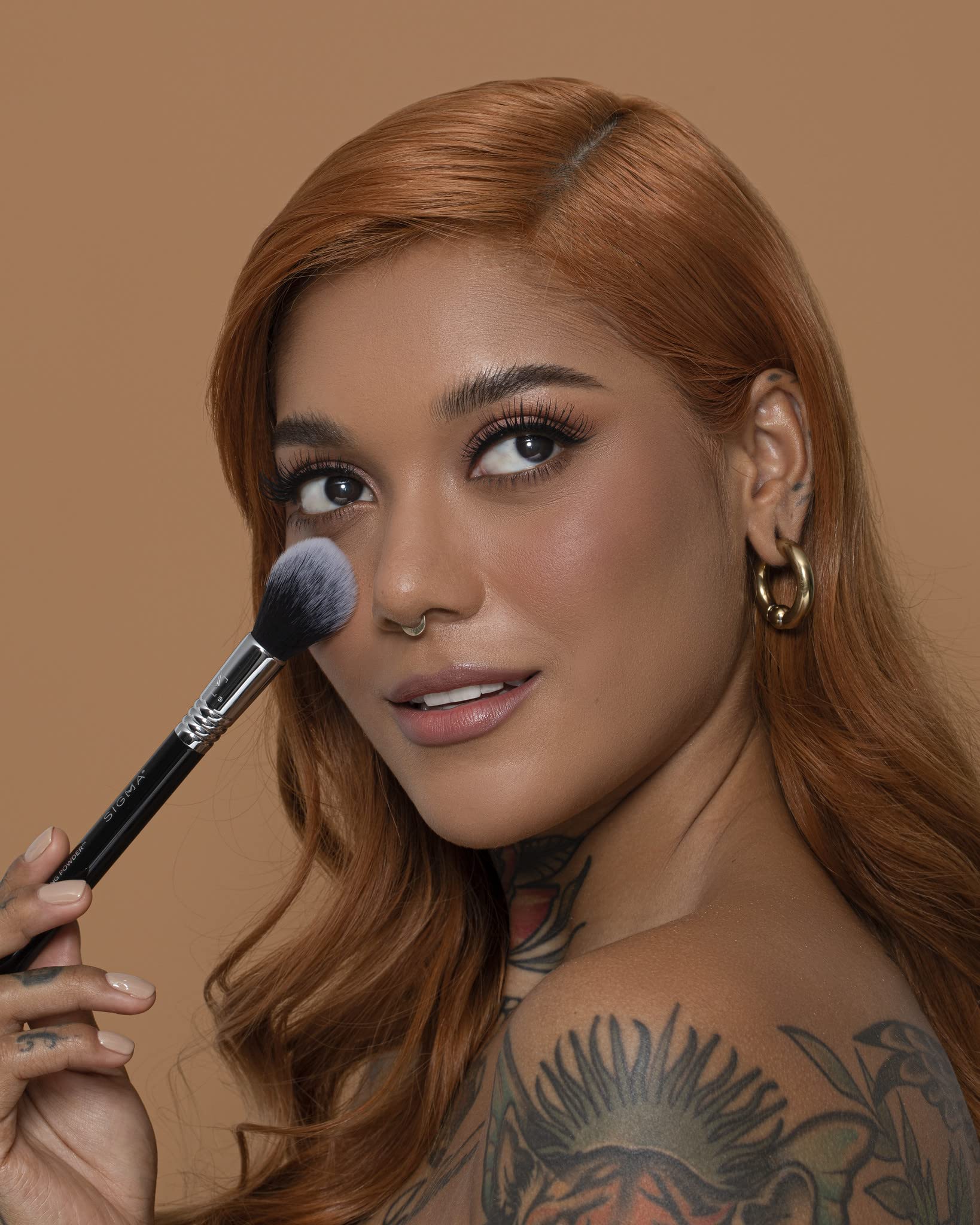 Sigma Beauty F12 – poudre durable et retouches quotidiennes.