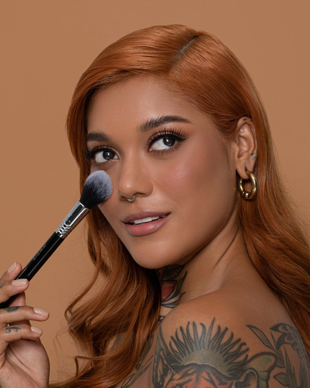 Sigma Beauty F12 – poudre durable et retouches quotidiennes.