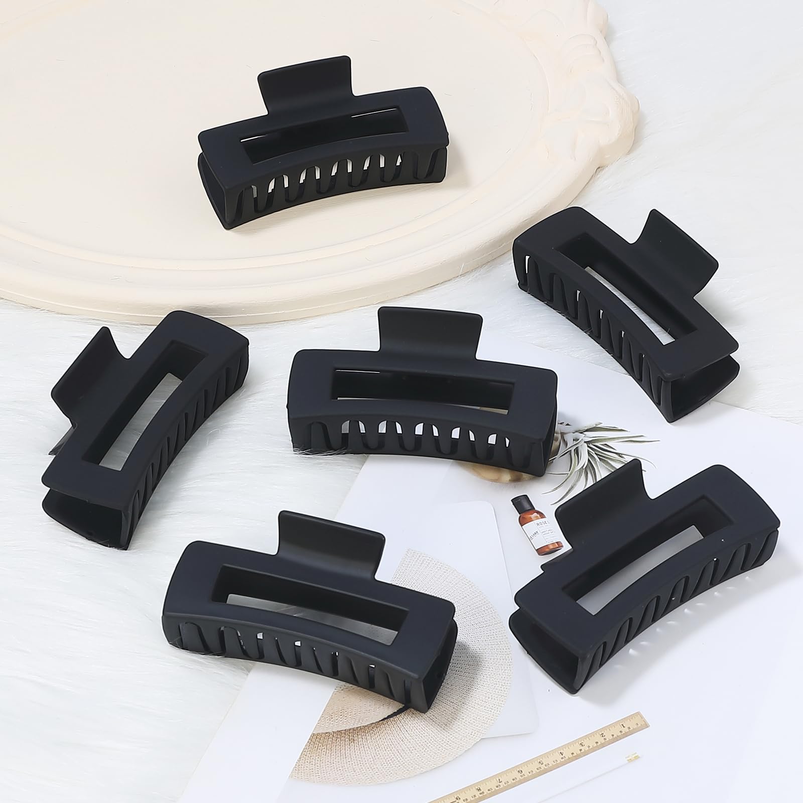 Sisiaipu accessoire cheveux noir épais, clip robuste pour séances sport et maquillage.