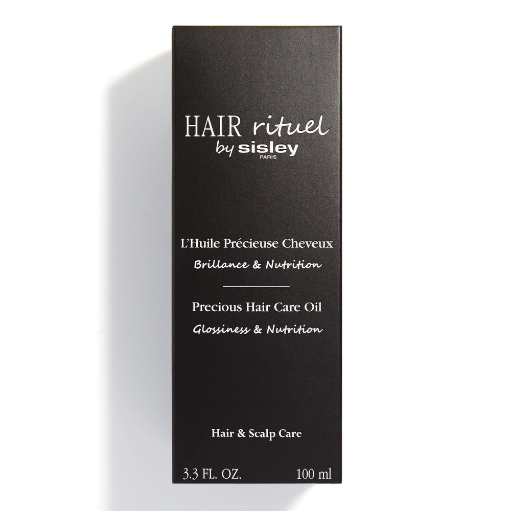 Hair Rituel par Sisley – huile nourrissante à base d huiles de moringa et coton pour les longueurs.