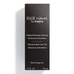 Hair Rituel par Sisley – huile nourrissante à base d huiles de moringa et coton pour les longueurs.