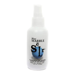 Skin Illustrator Blue Marble: flacon fixateur hydrobase durable pour le maquillage.