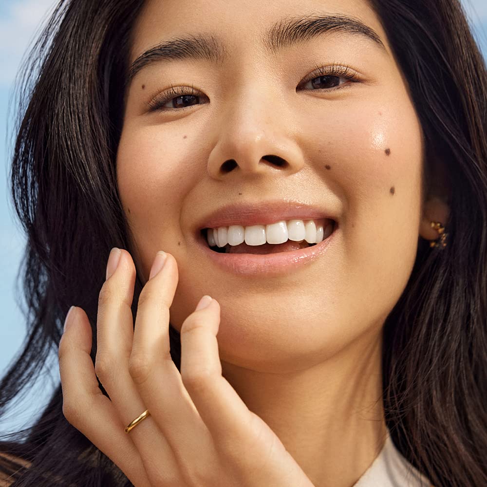 Peau au teint uniforme après utilisation de l huile de raisin Sky Organics