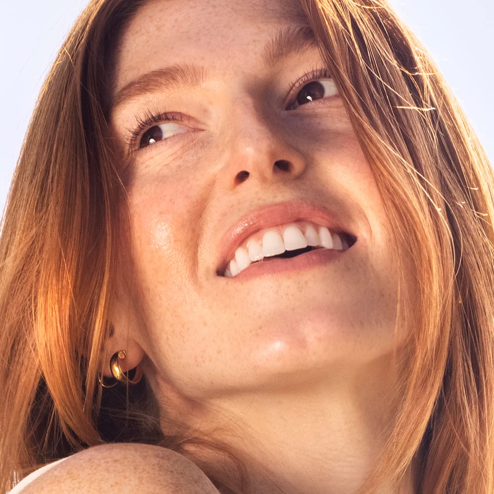 Hydratation intense des cheveux grâce à Sky Organics huile coco bio.