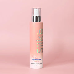 Sleek'e Hair Silk'e Hair démêlant, cheveux brillants et doux après utilisation.