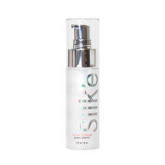 Sleek'e Silk'e sérum réparateur dans sa bouteille, application facile pour cheveux soyeux.