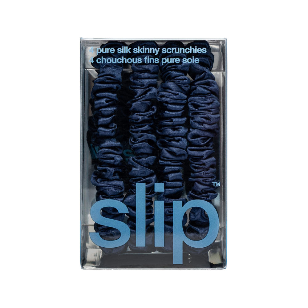 Élastiques Slip fins en soie bleu marine, tenue douce sans perte de volume.