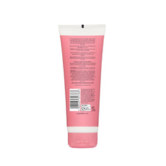 Application fluide du sérum Soap & Glory sur la peau.