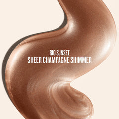 Goutte d'huile Rio Sunset Glow Oil sur peau, fini lumineux.