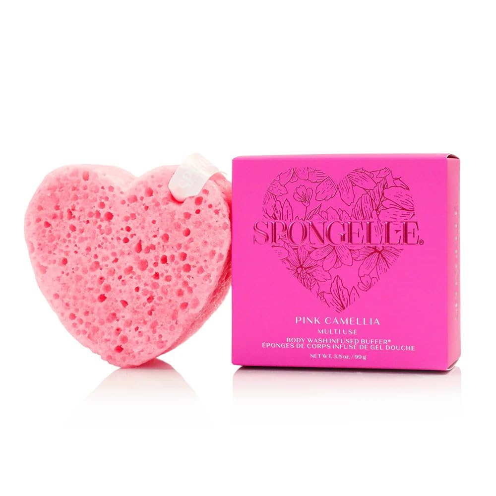 Éponge gommante SPONGELLÉ camélia rose en forme de cœur, exfoliation douce.