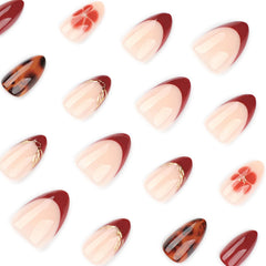 Design tortue et fleurs dorées sur les ongles stbisen tendance.