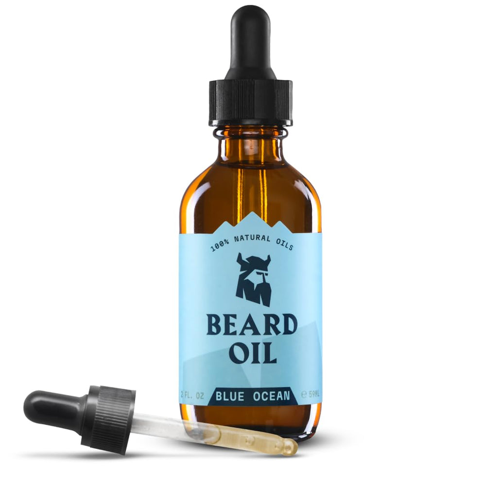 Huile barbe Striking Viking – flacon bleu, application rapide et non grasse.