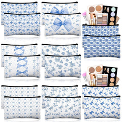 Trousse Stuffygreenus bleu avec nœud et fleurs, idéale pour ranger le maquillage en voyage.