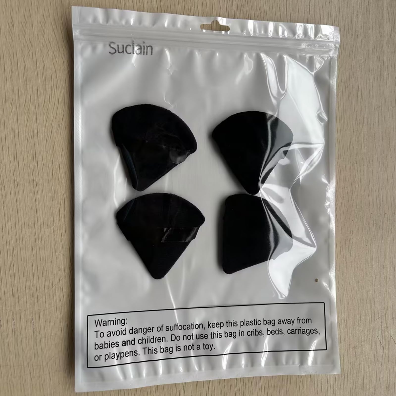 Éponge Suclain triangle velours prise en main agréable et compacte