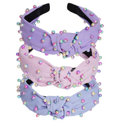 Bandeau Sucrain en perles rose, élégant et polyvalent pour tous les jours.