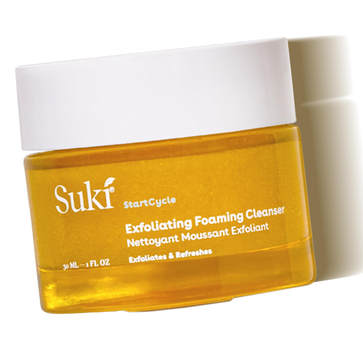 Suki Exfoliant Moussant dans une bouteille, nettoyage rafraîchissant sans dessèchement.