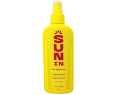Sun-In hair lightener outdoors uses warmth to brighten natural highlights.
