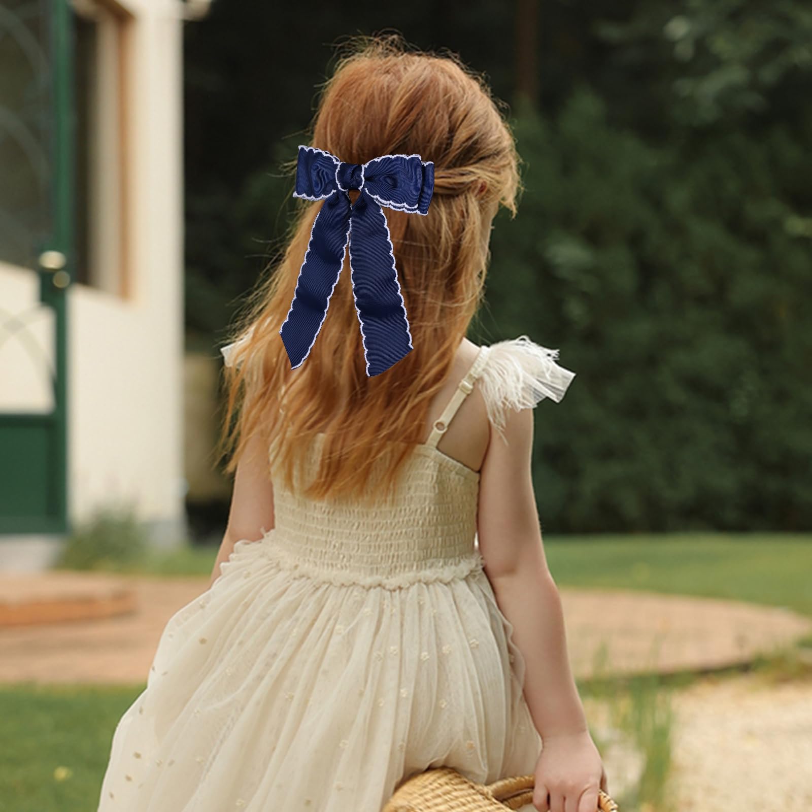 Supclips broche cheveux noeud grosgrain bleu marine blanc, style chic et pratique.