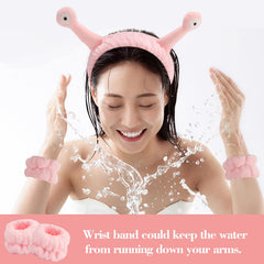 Bandeau SuPoo au design extraterrestre rose, pratique pour le soin quotidien.