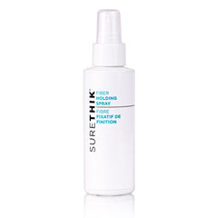 Surethik spray maintien-fibres : bouteille citron léger pour une tenue fiable.