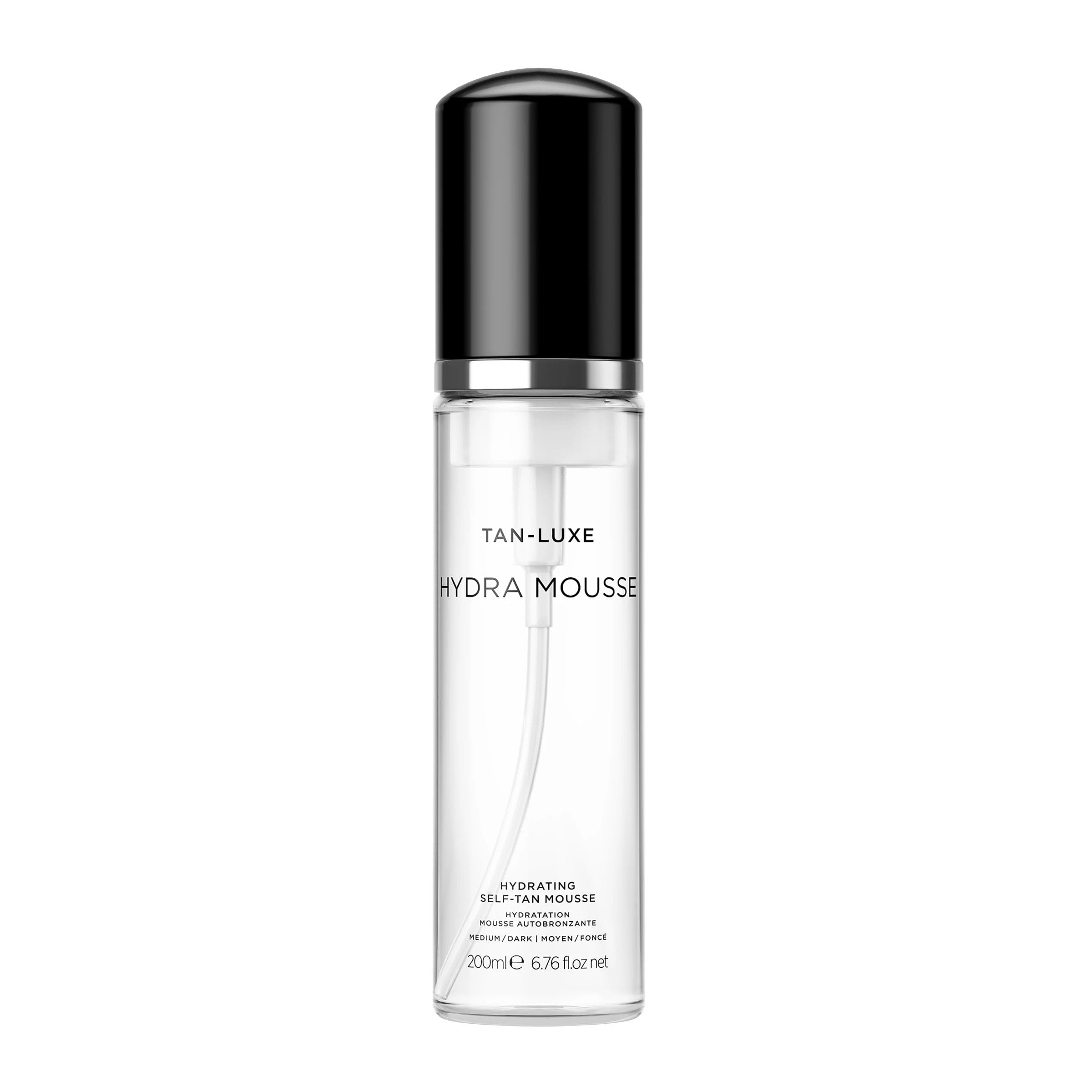 Tan-Luxe Hydra Mousse – flacon clair, hydratation sans transfert pour une peau lumineuse.