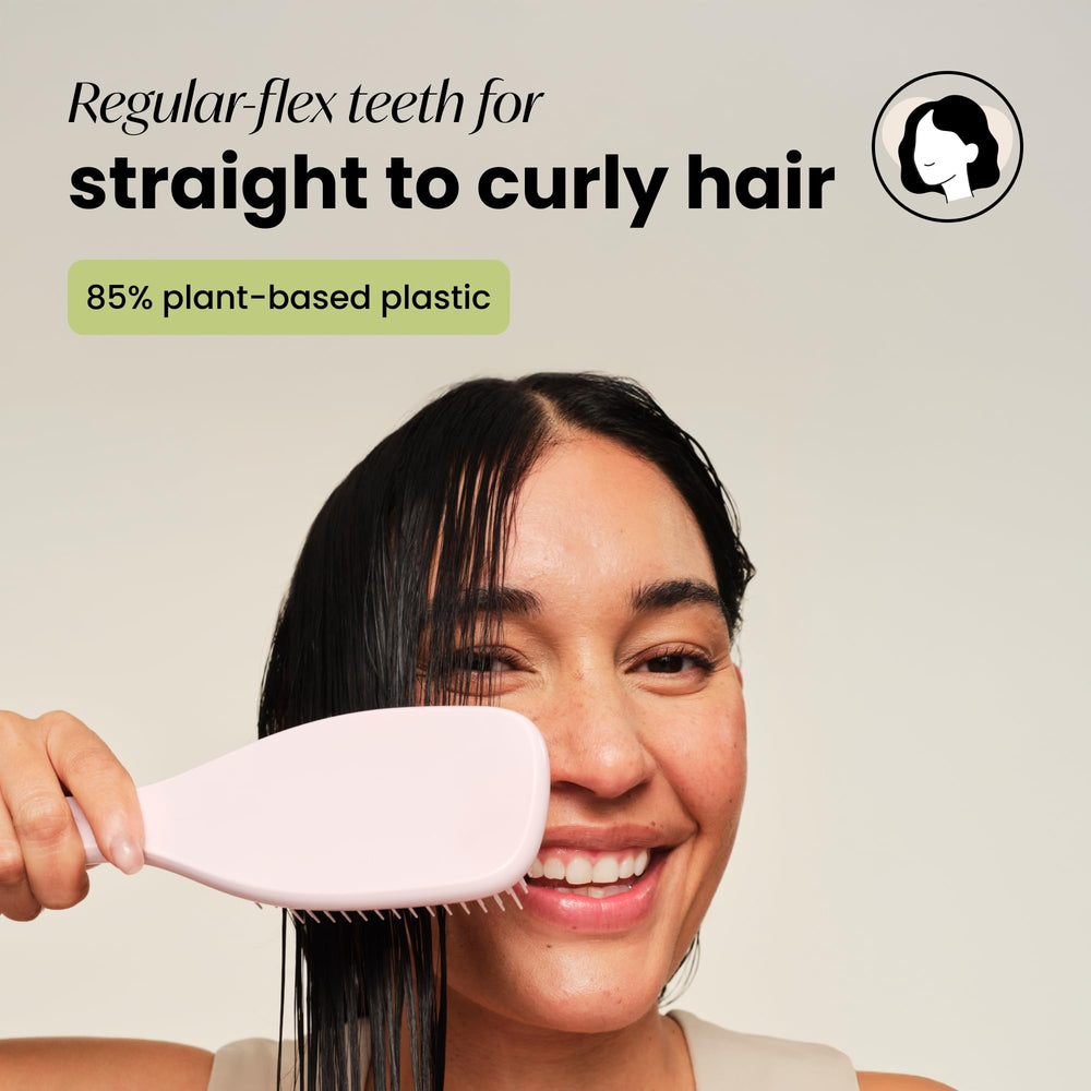 Brosse Tangle Teezer pour douche, idéale pour répartir uniformément les soins.