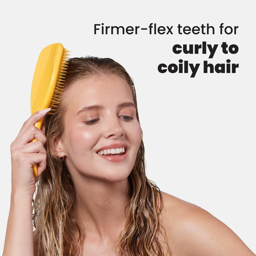 Tangle Teezer Ultimate Detangler grande spatule pour distribution uniforme des produits.