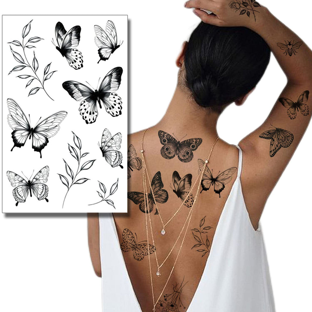 Tatouage Tazimi au cou papillon noir, allure artistique et portable