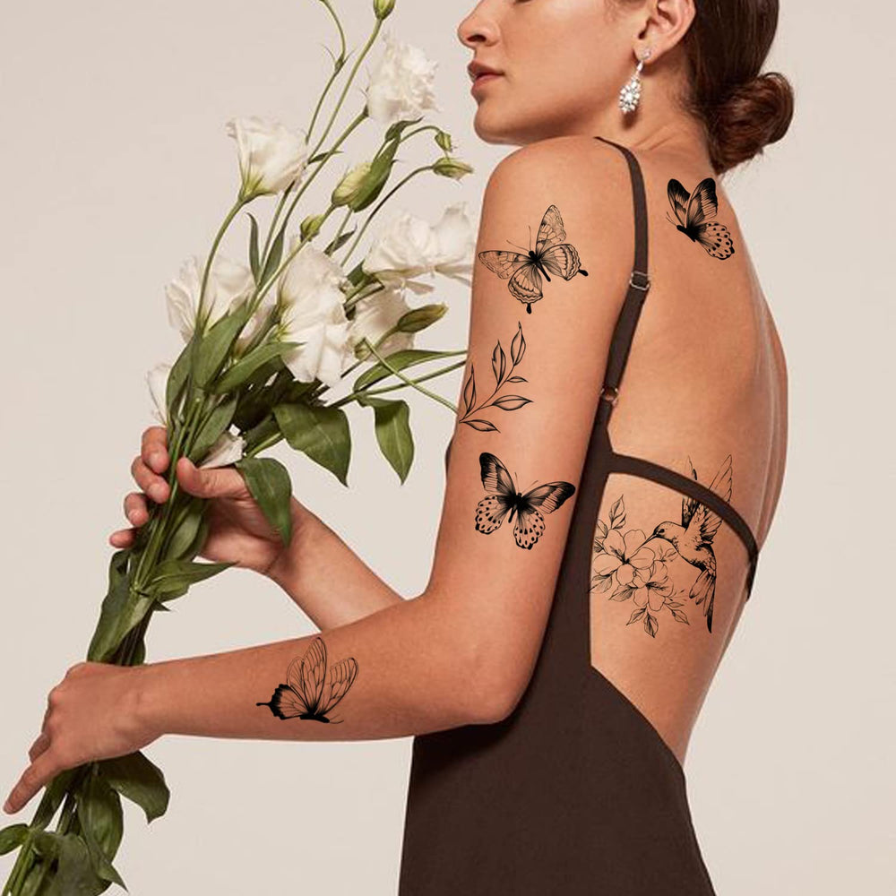 Tatouage Tazimi au poignet papillon noir, look chic et temporaire