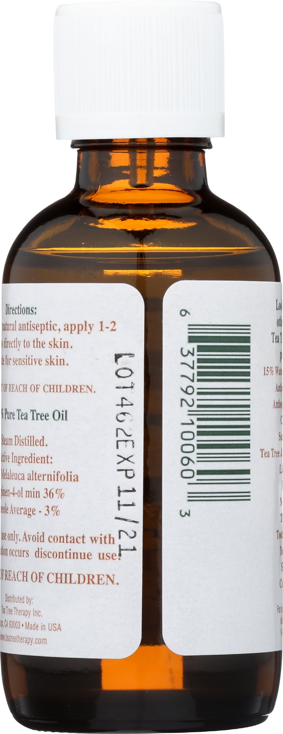 Tea Tree Therapy label closeup highlighting pure Australian tea tree oil quality and purity.