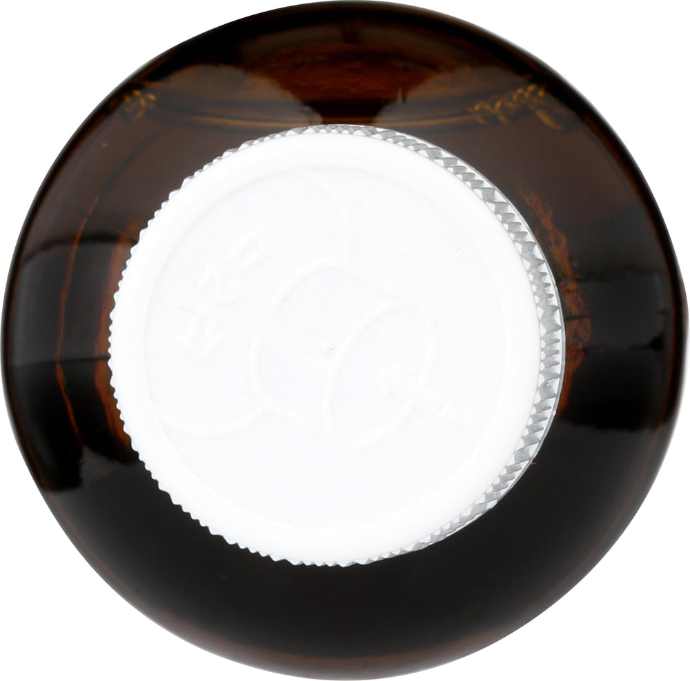 Tea Tree Therapy oil applied to skin showing gentle feel and quick absorption.