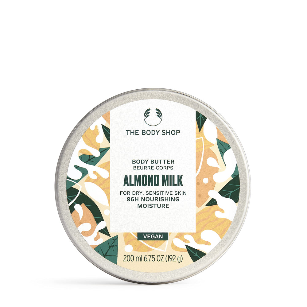 The Body Shop Almond Milk Body Butter, texture crèmeuse pour hydratation durable.