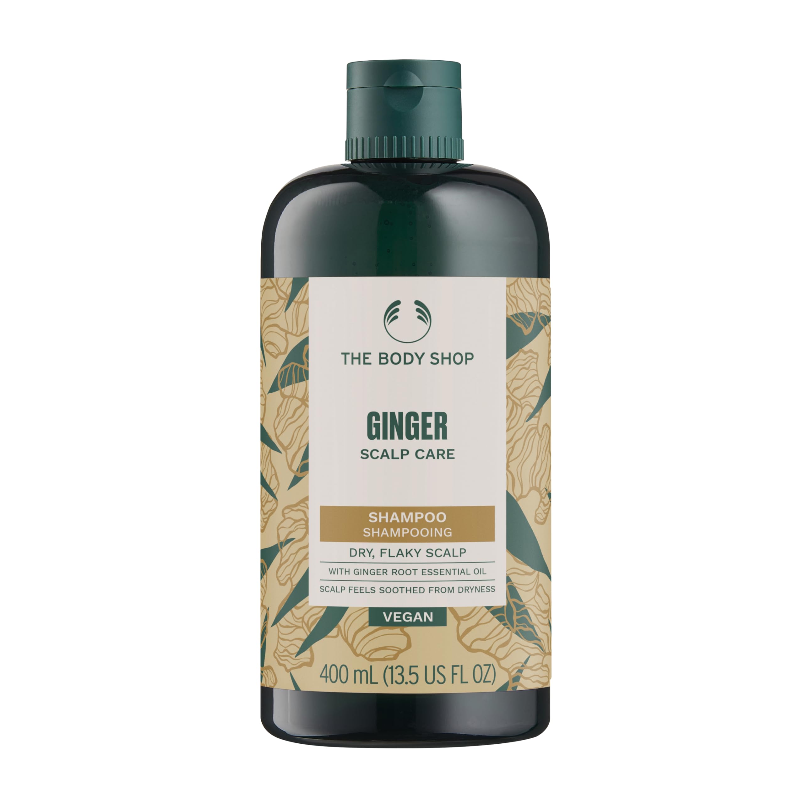 Shampoing Gingembre The Body Shop, bouteille: apaise le cuir chevelu sec et rafraîchit.