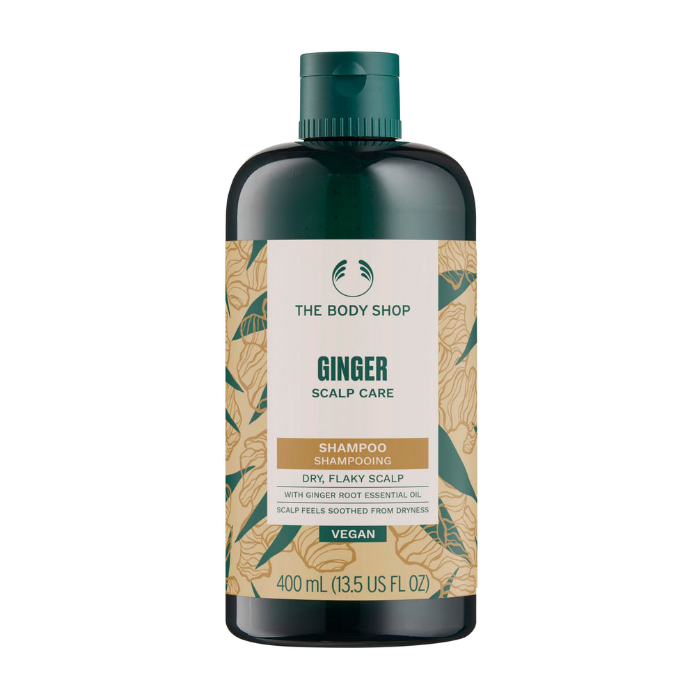 Shampoing Gingembre The Body Shop, bouteille: apaise le cuir chevelu sec et rafraîchit.