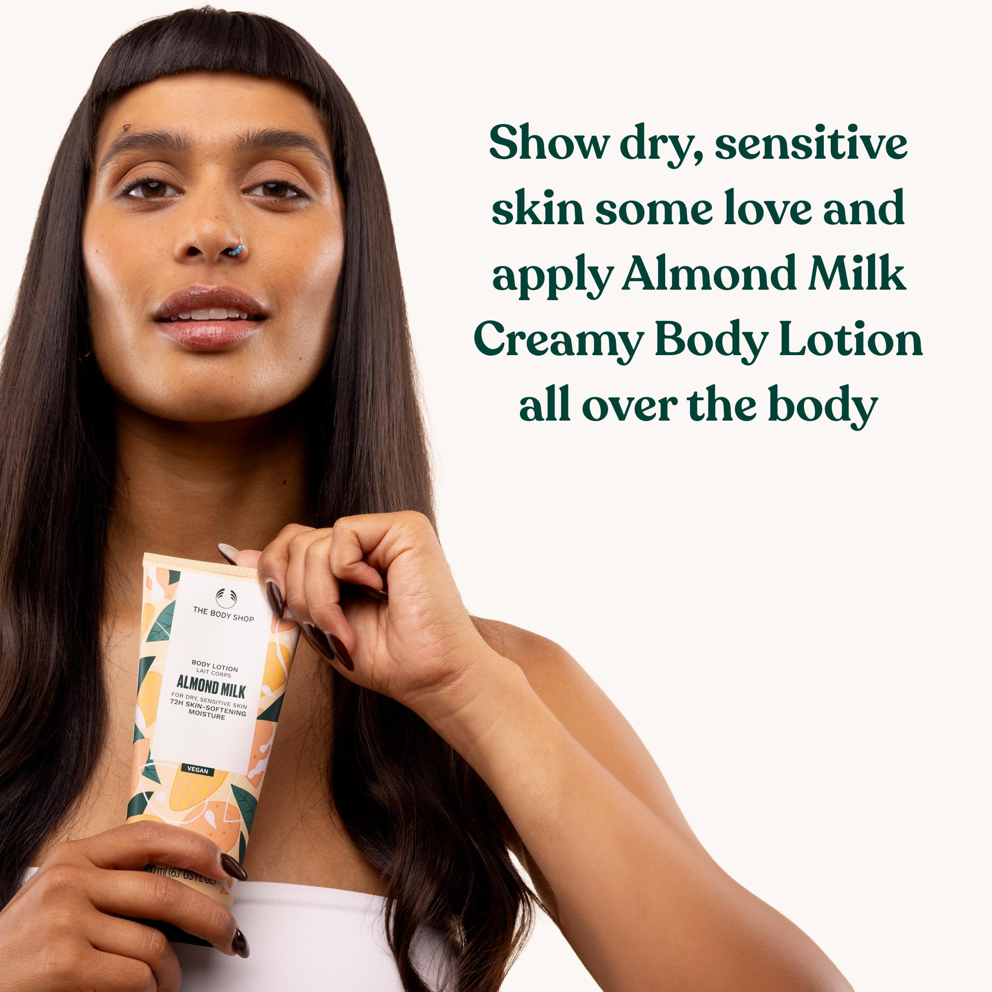 The Body Shop Ingrédients nourrissants - lait d'amande et miel pour peau radieuse.